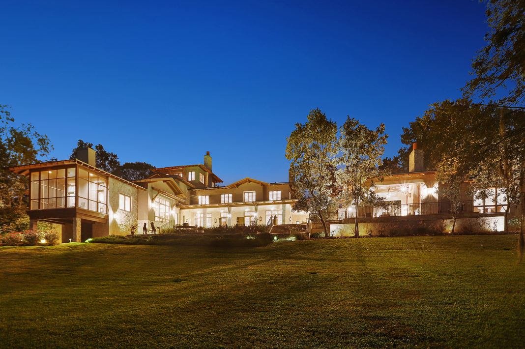 1100 Knollwood House-back house night-residential Top homes on 2021 market